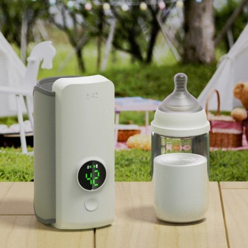 Portable air purifier and baby bottle on a wooden table with a garden background